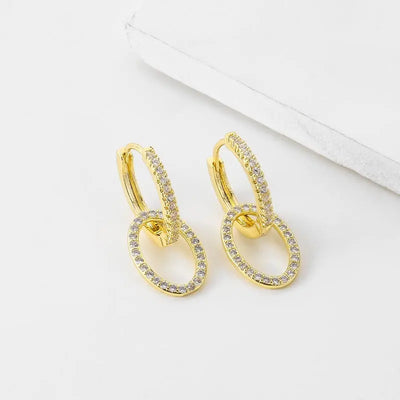 Boucles d'oreilles Ramiart en zircon doré, style coréen avec double anneau croisé, parfaites pour une touche d'élégance quotidienne.