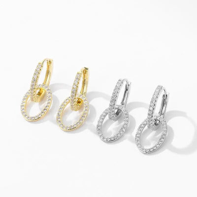 Boucles d'oreilles Zircon Ramiart - Style coréen en or et argent, design croisé à deux anneaux sertis de zircon pour un look moderne et raffiné.